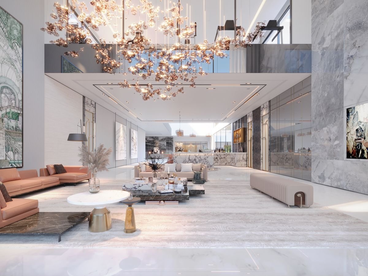 Luxury double-height living room with designer sofas, marble tables and statement chandelier