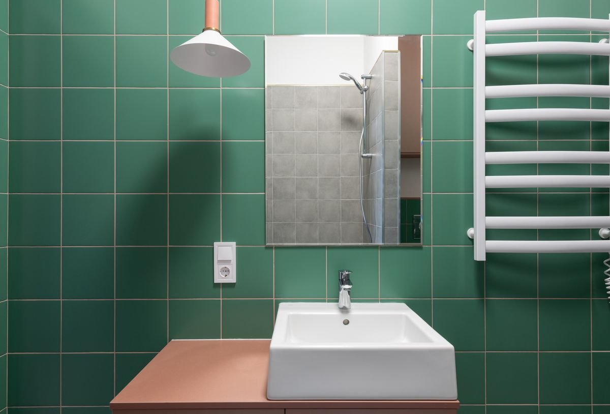 Emerald Green Tiled Bathroom with Floating Basin and Pendant Light