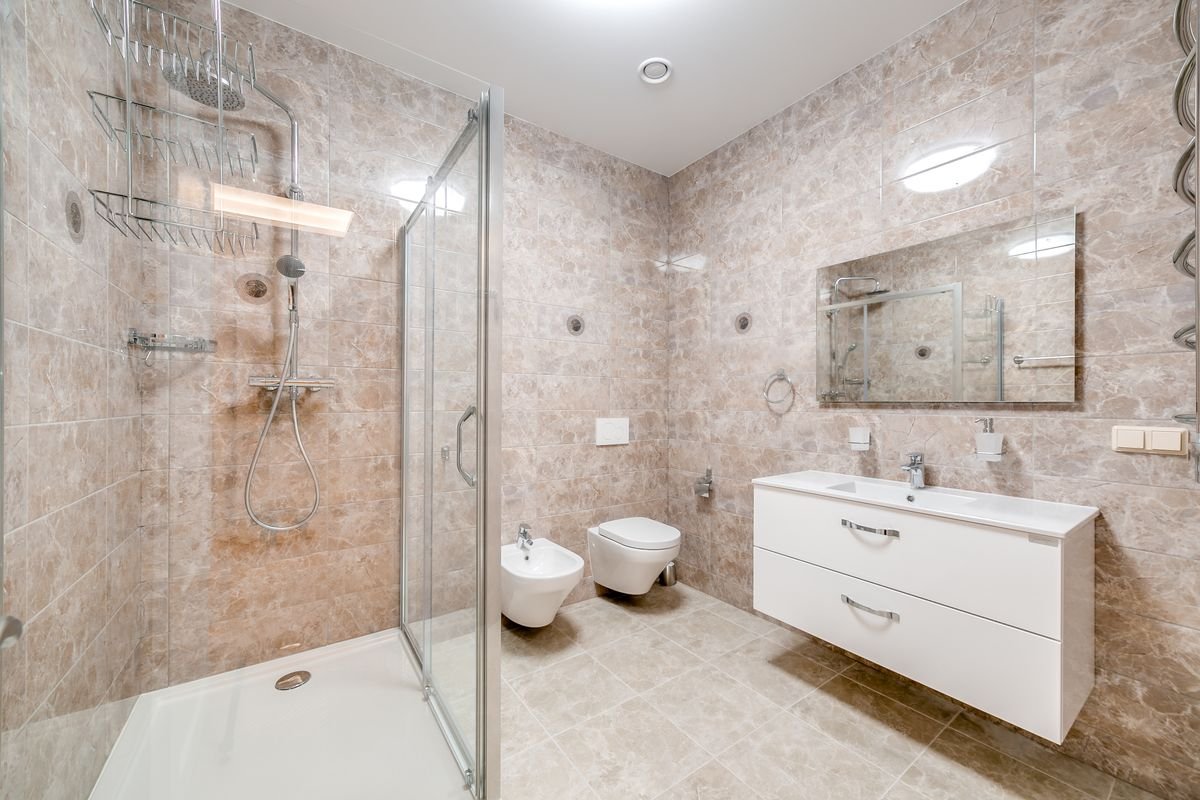 Minimalist Bathroom with Glass Partition Shower and Floating Vanity