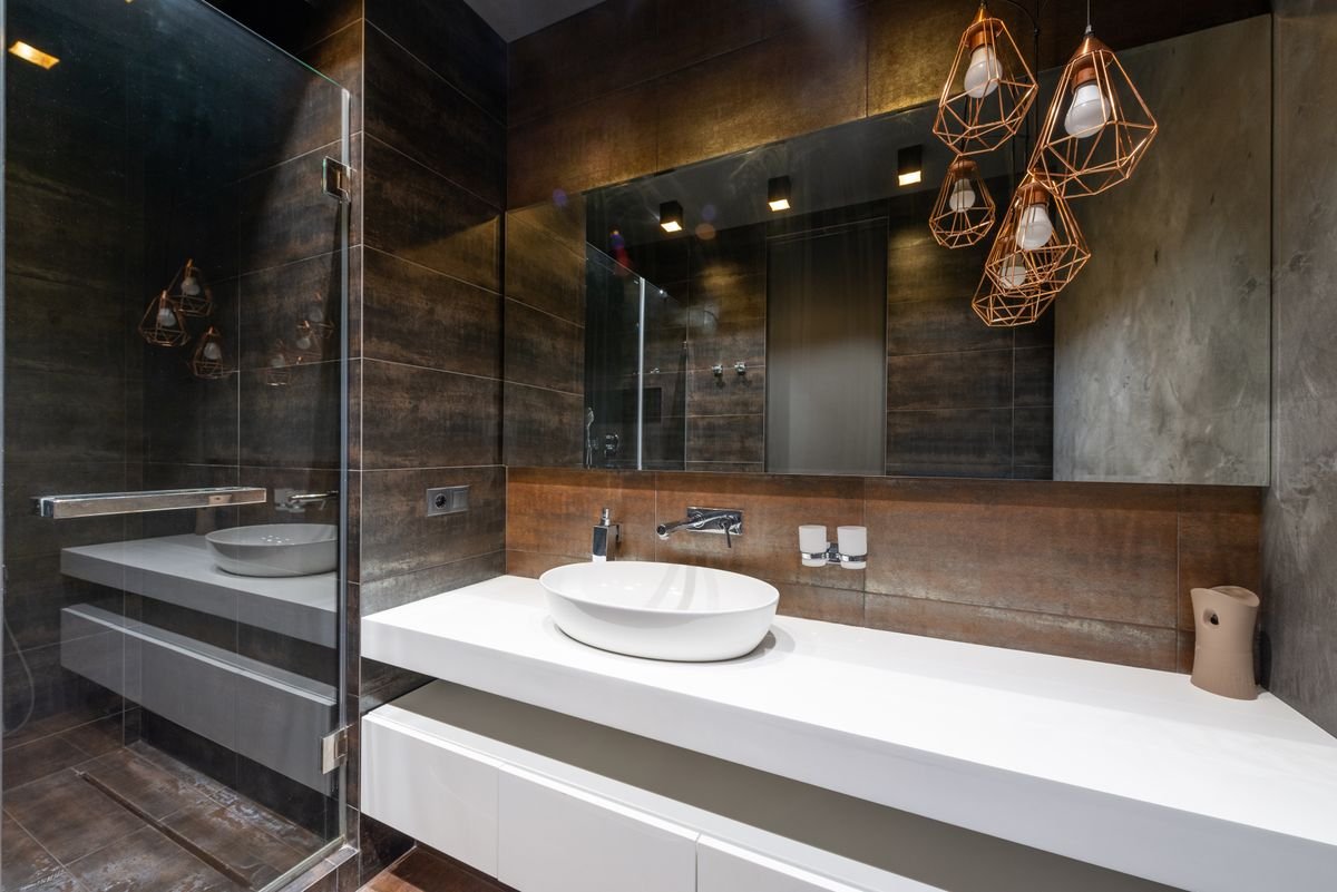 Vessel Sink Bathroom with Copper Geometric Pendant Lights