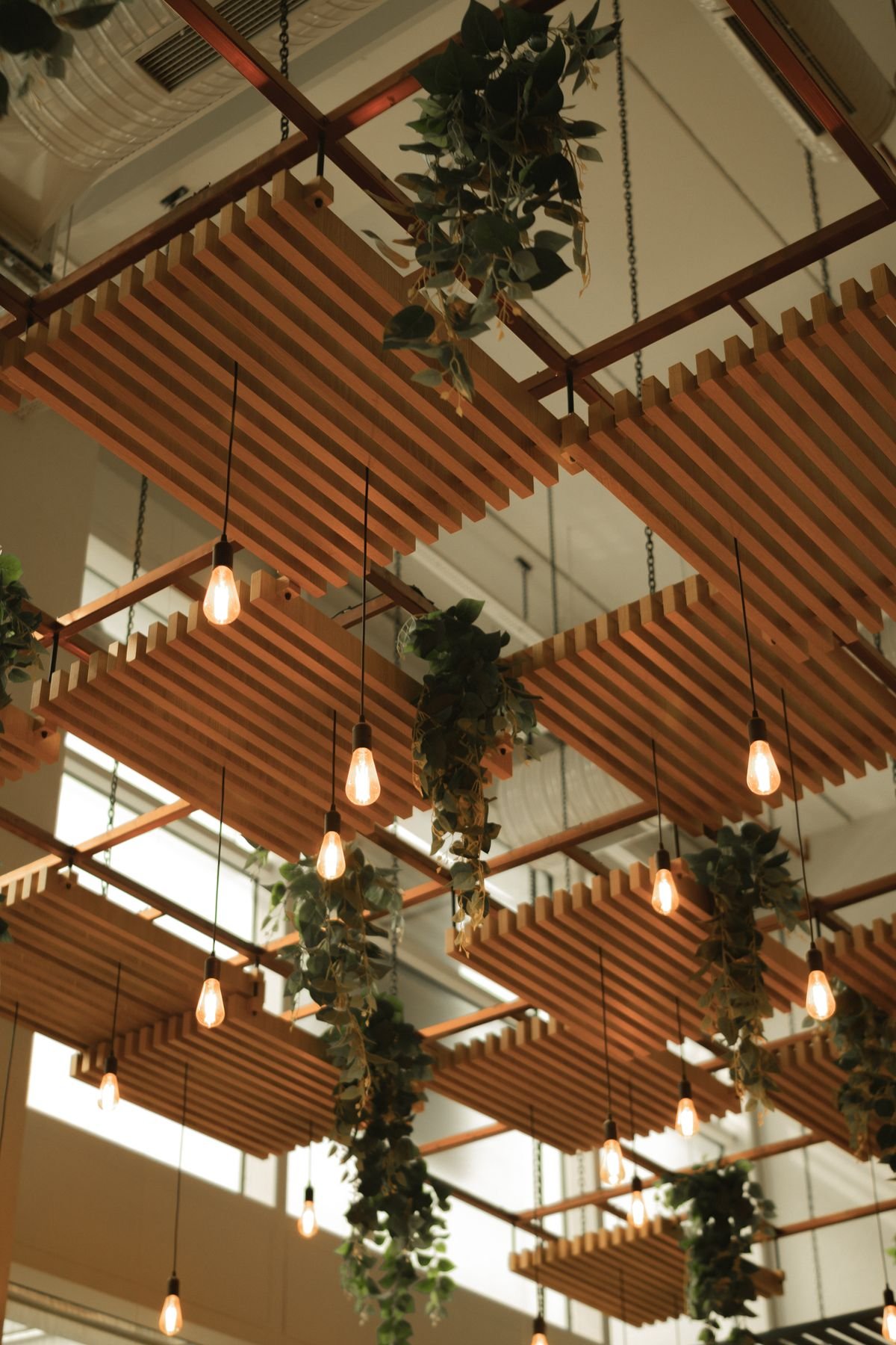 Designer Wooden Slat False Ceiling with Pendant Lighting
