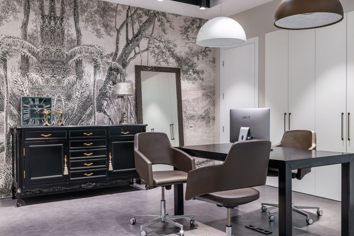 Sophisticated Home Office with Botanical Mural Wall and Leather Chairs