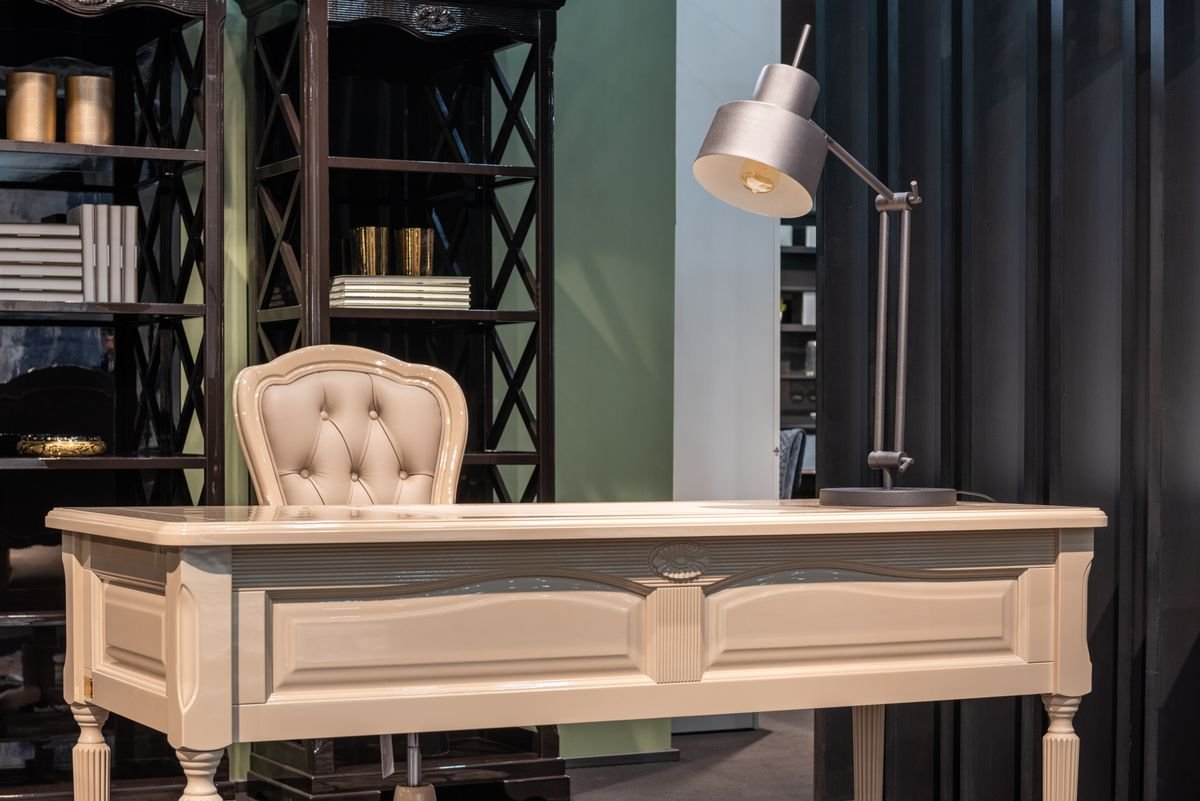 Executive Home Office with Tufted Chair and Display Shelving