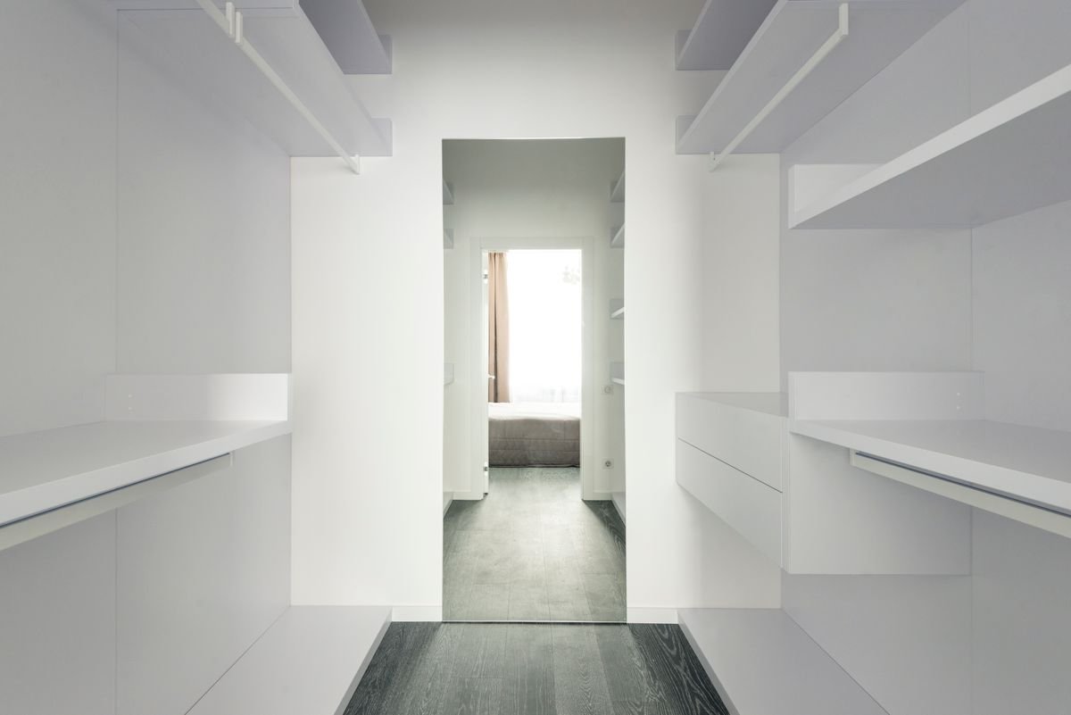 Minimalist White Walk-in Wardrobe with Open Shelving