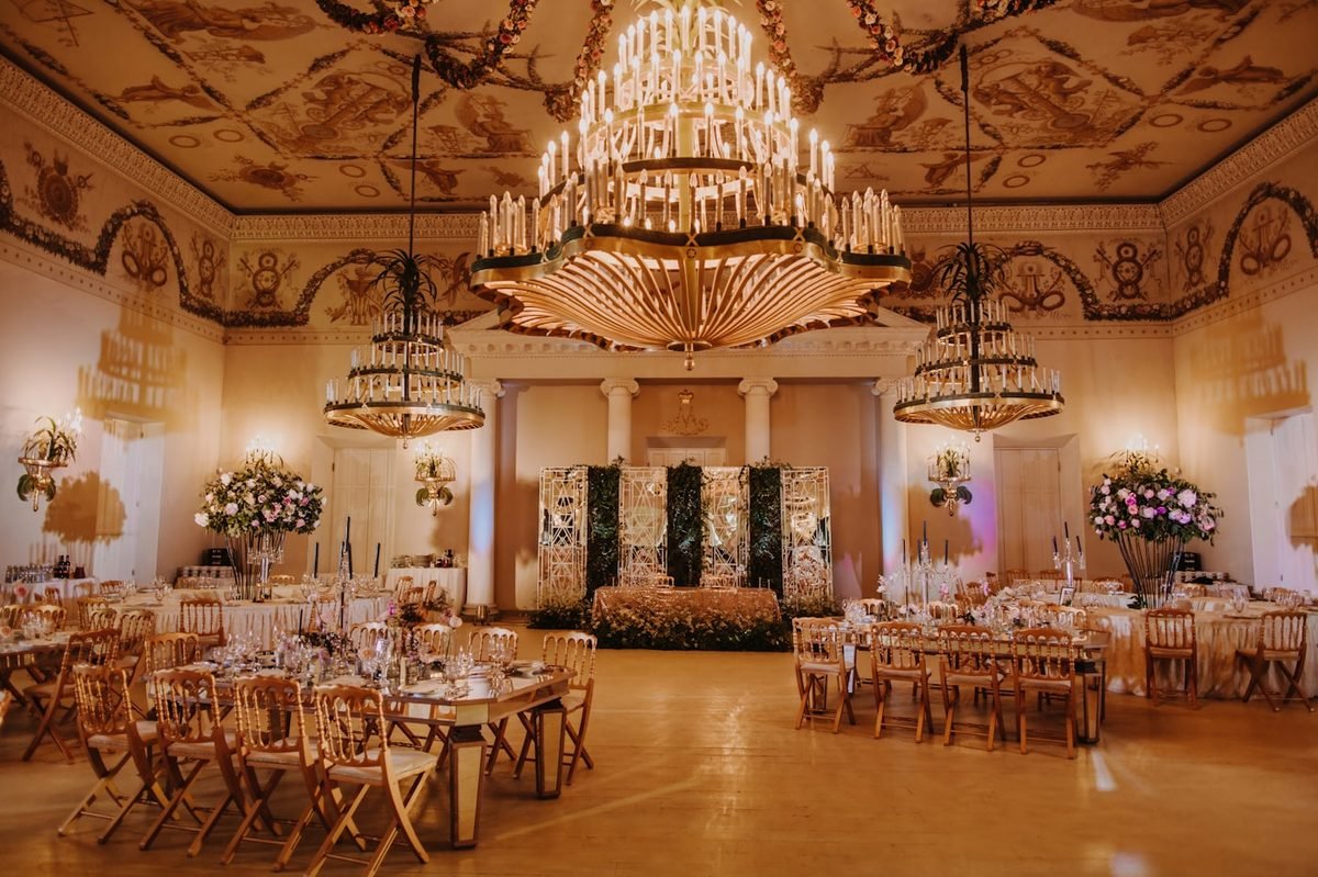Statement crystal chandeliers in a grand hall
