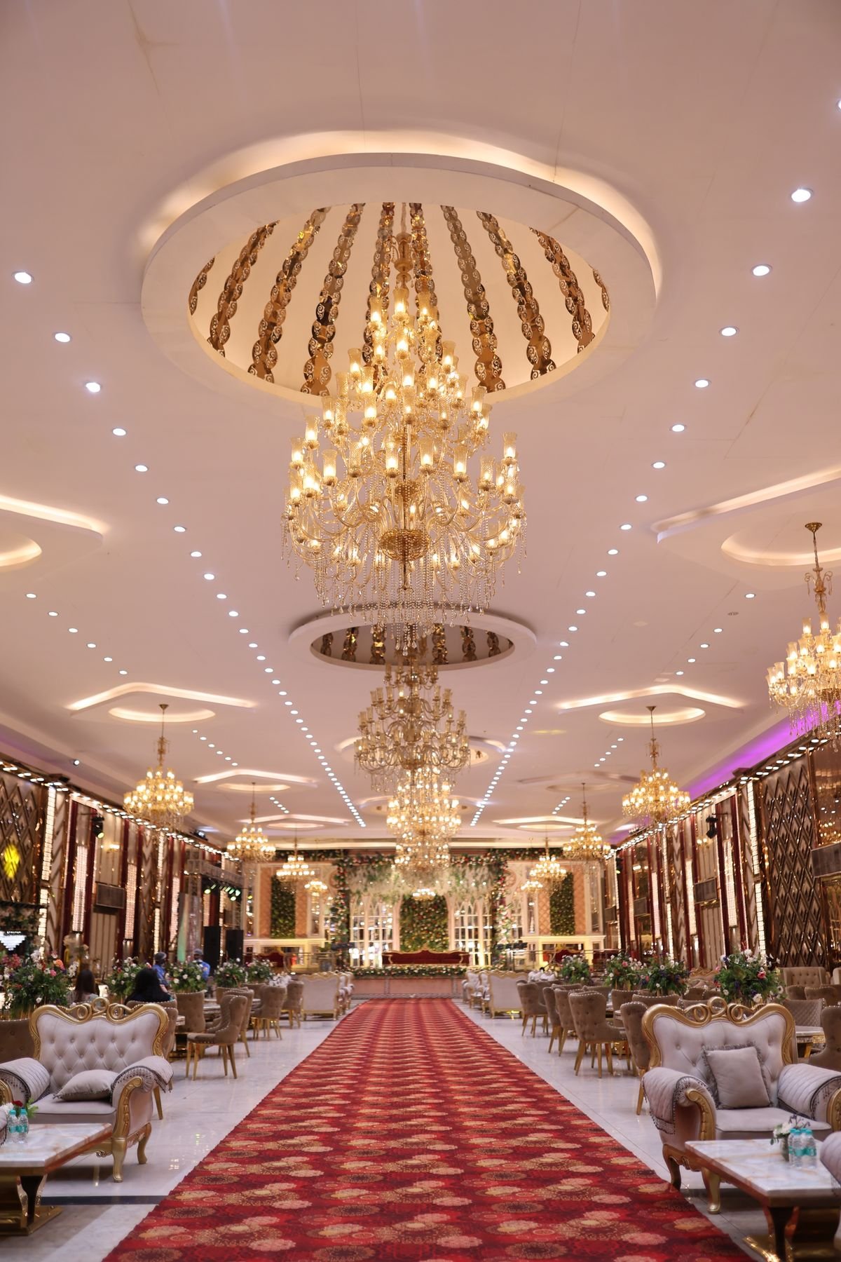 Opulent Ballroom with Cascading Gold Crystal Chandelier