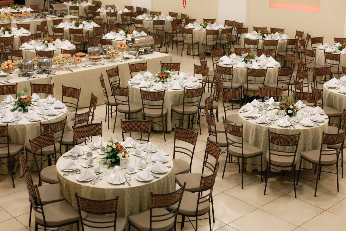 Banquet Hall Buffet Setup with Round Tables and Catering Display