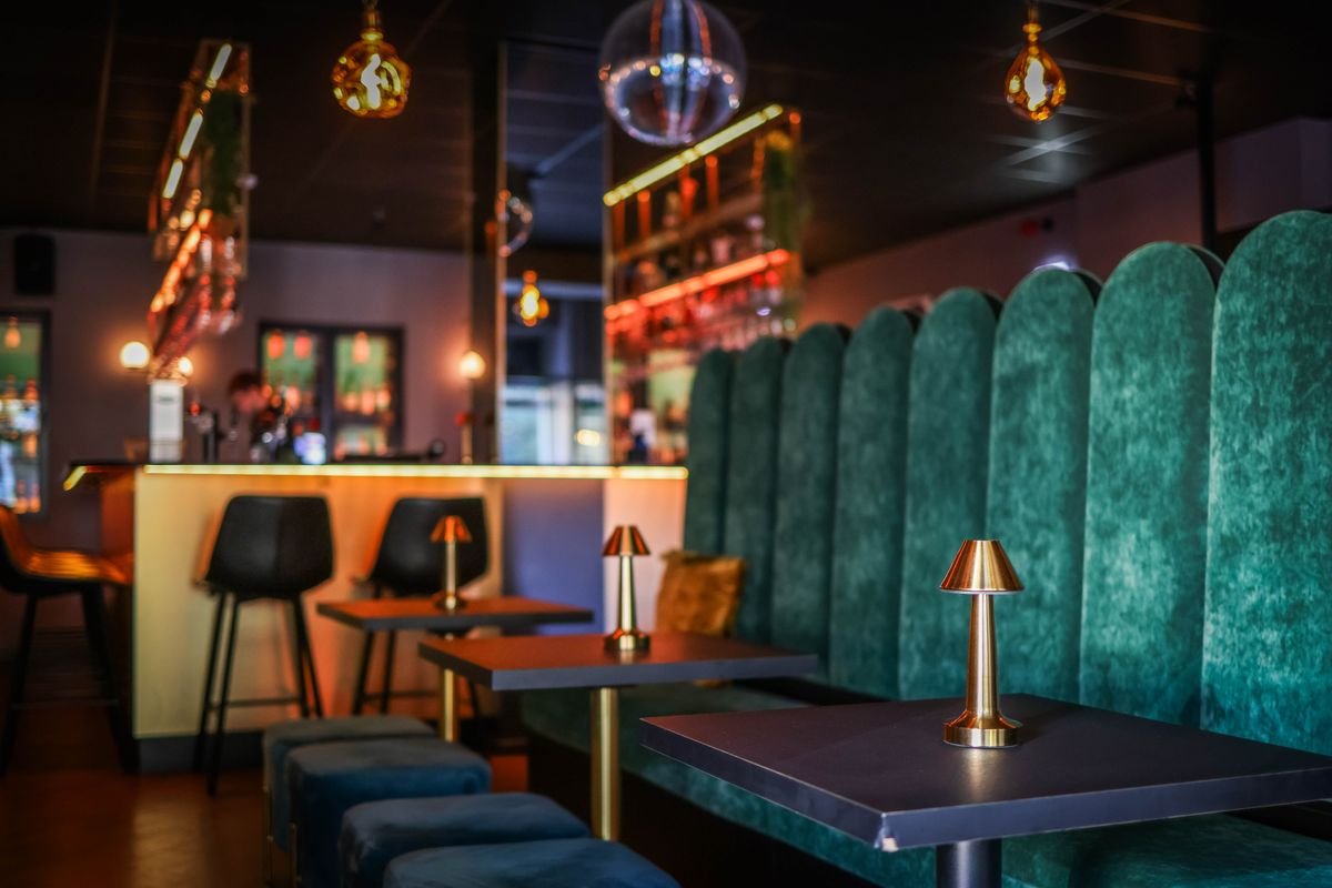 Green Velvet Booth Lounge with Brass Table Lamps