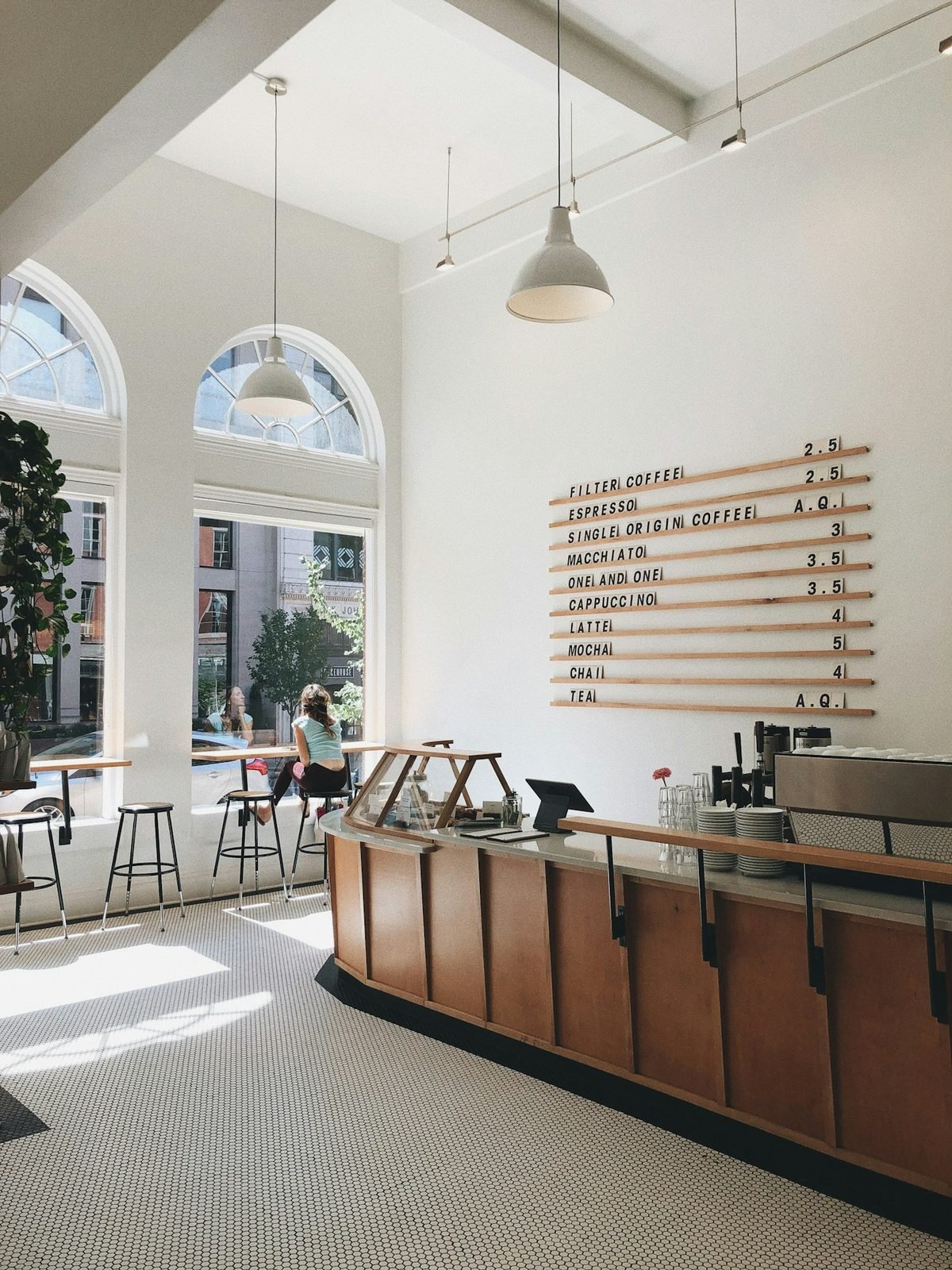 Minimalist Coffee Bar with Curved Counter Design
