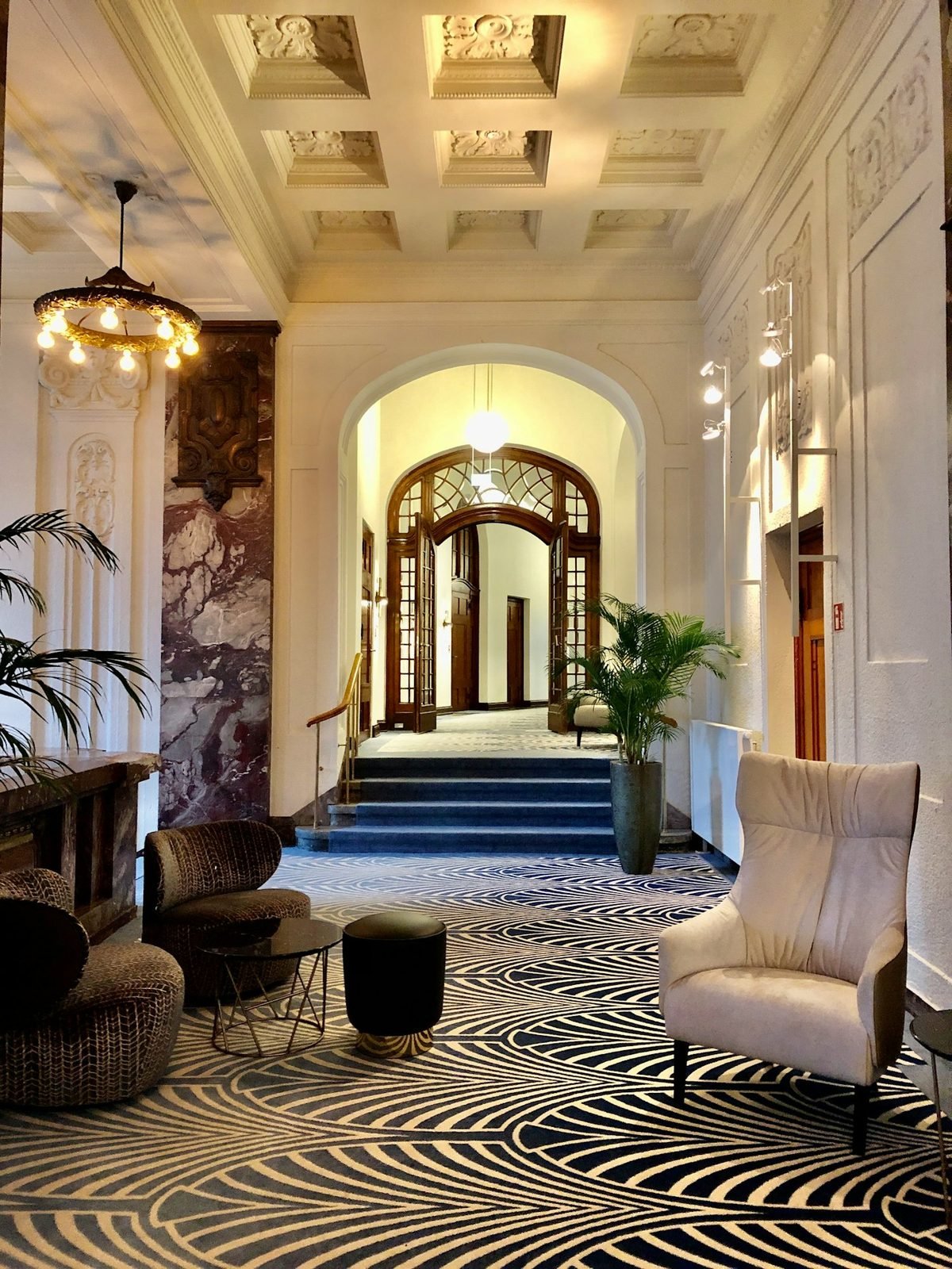 Grand Entrance Hallway with Patterned Marble Flooring