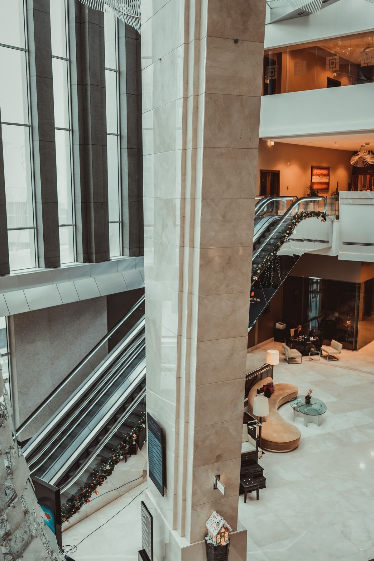Multi-Level Atrium Lobby with Escalators and Lounge Seating