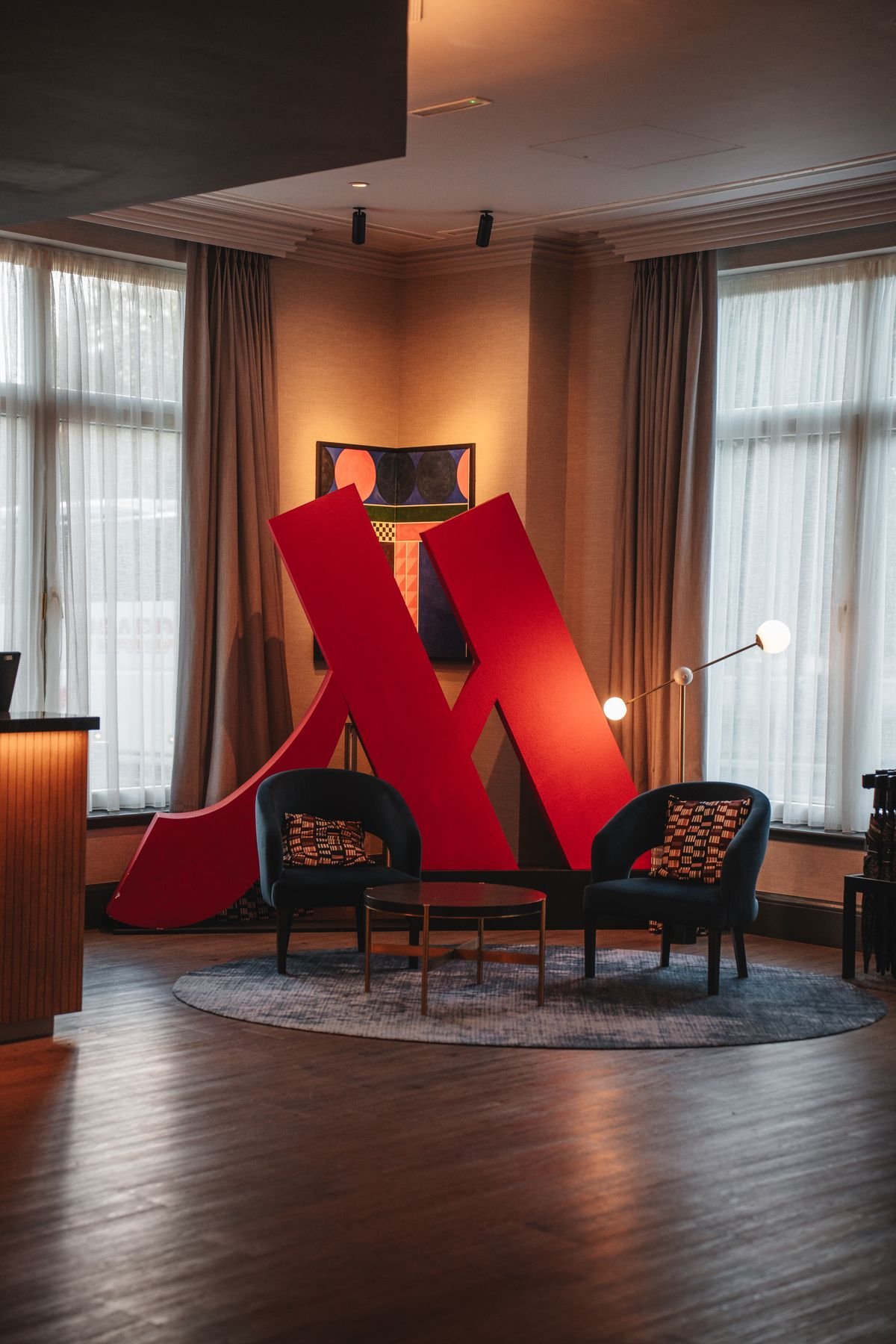 Artistic Lobby Lounge with Bold Sculptural Accent Piece