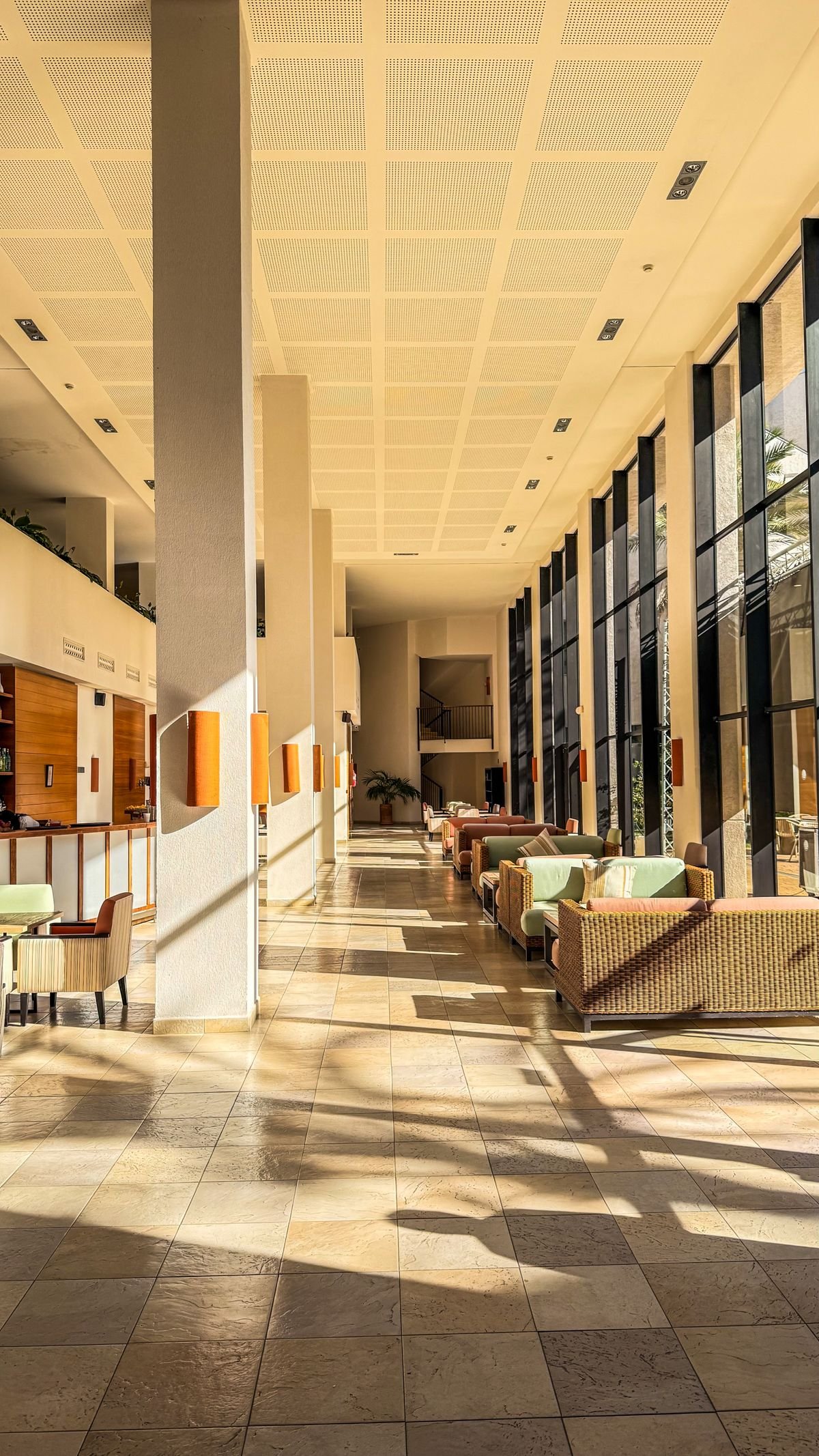 Warm Resort Lobby Corridor with Woven Rattan Furniture