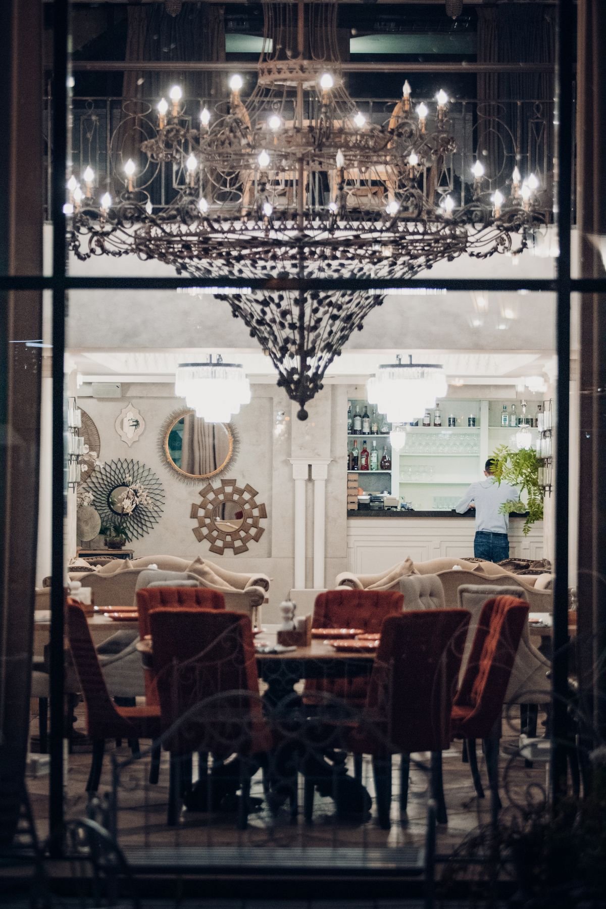 Glamorous Restaurant with Grand Crystal Chandelier and Bar View