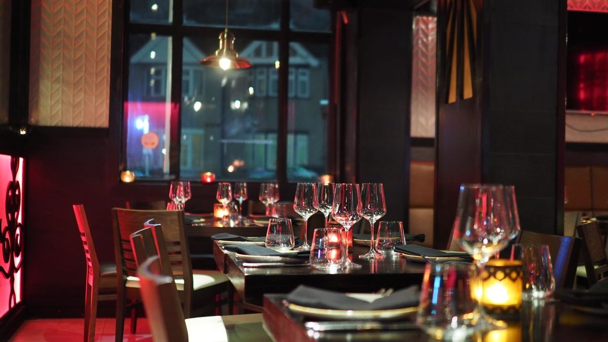 Moody Red Velvet Booth Restaurant with Ambient Lighting