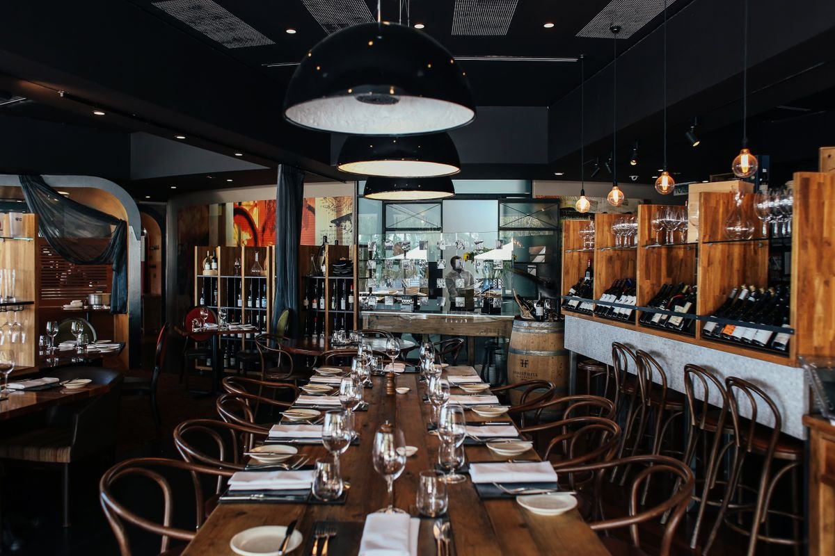 Rustic Wine Bar Restaurant with Communal Wooden Table