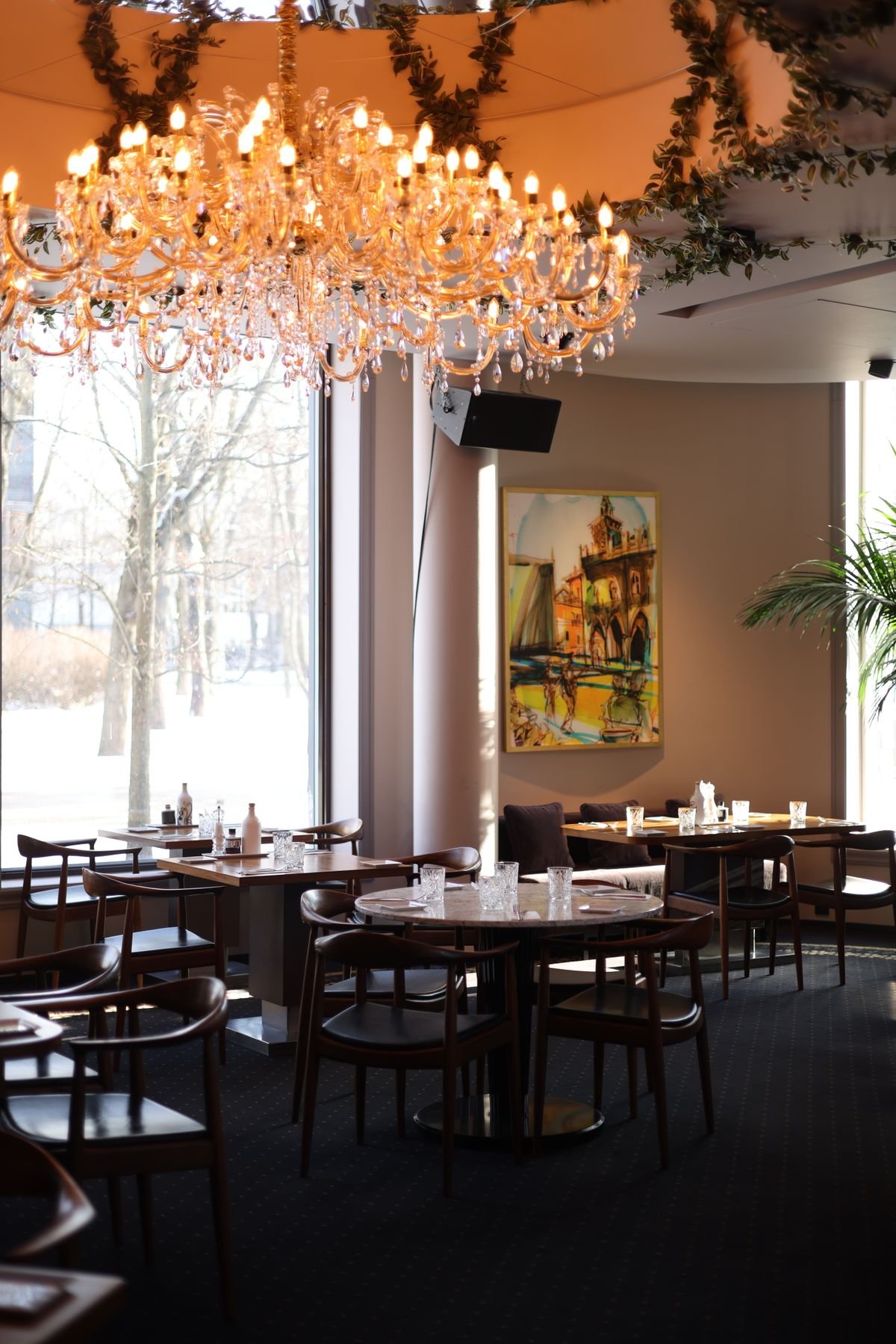 Elegant Restaurant with Crystal Chandelier and Garden View