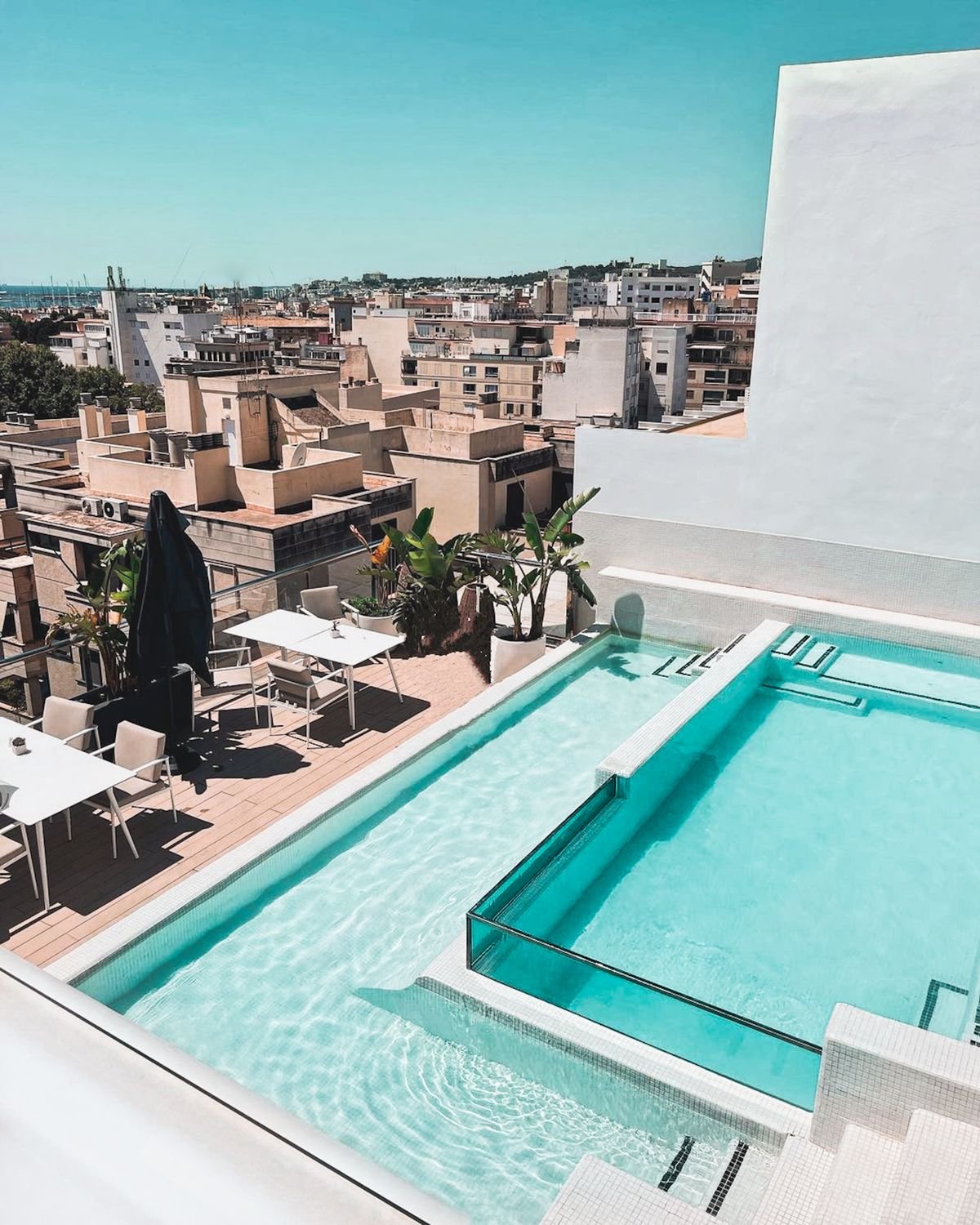 Rooftop Infinity Pool Deck with City Skyline Views