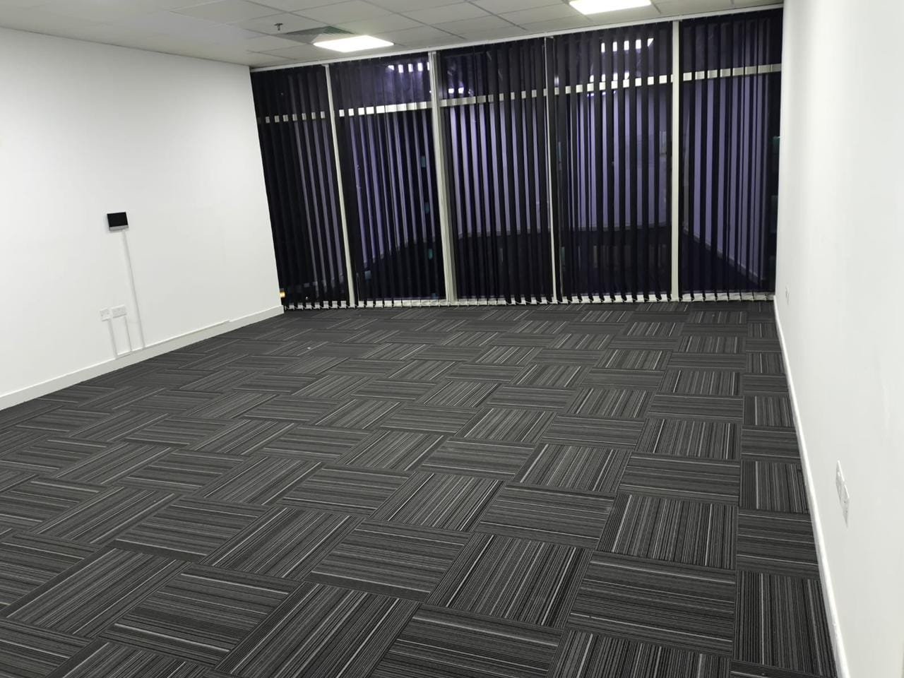 Dark Carpet Tile Flooring for an Office Room