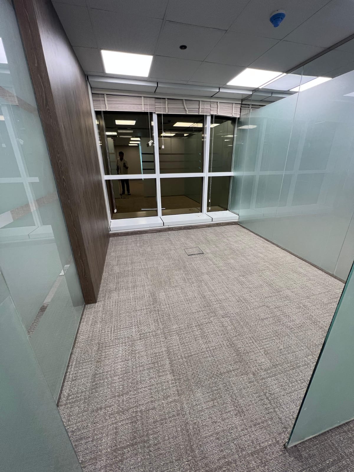 Frosted Glass Cabin with Carpet Tile Flooring