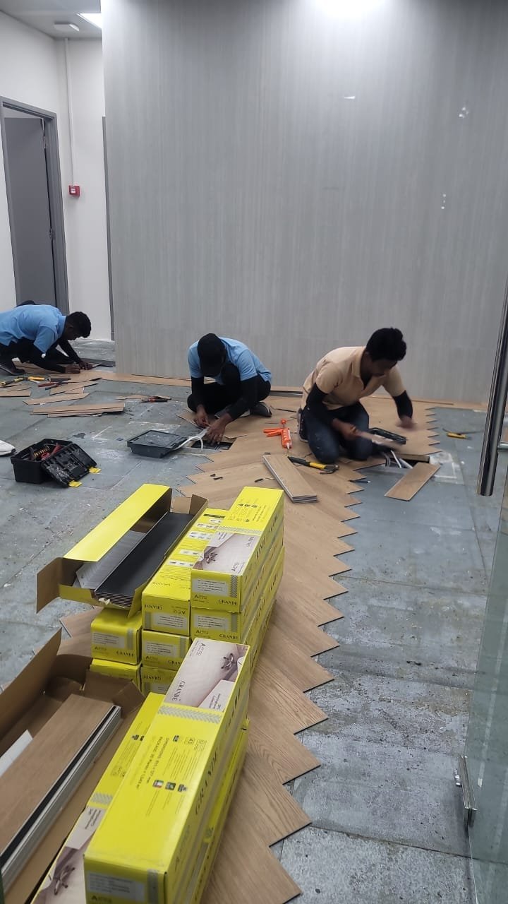 Herringbone Wood-Look Flooring Being Laid on Site